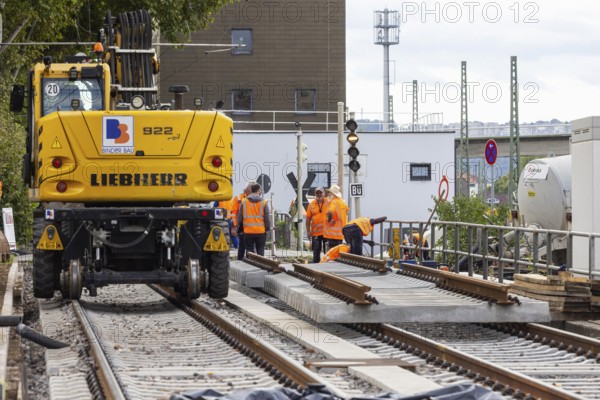 Track construction by Stuttgarter Straßenbahnen AG (SSB) near the Eszet stop. The rails of the U13 line are being renewed due to their age. Stuttgart, Baden-Württemberg, Germany