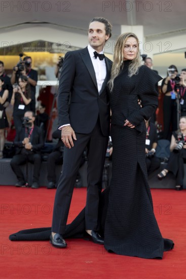 Venice, Italy - 2 September 2025: Rory St. Clair Gainer, Rebecca Ferguson during the Red Carpet of - A house of Dynamite - during the 82nd Venice International Film Festival