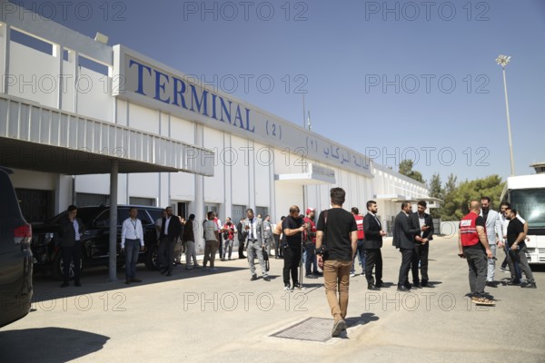 Officials from the Qatari and Syrian Red Crescents receive a Qatari airlift of aid to help the Syrian people, Damascus, Damascus, Syria