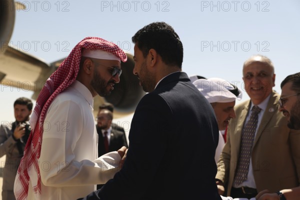 Syrian Health Minister Musab al-Omar welcomes a Qatari aircraft loaded with medical and humanitarian supplies at Damascus International Airport, part of Qatar's major aid to support Syria's recovery after the, Damascus, Damascus, Syria