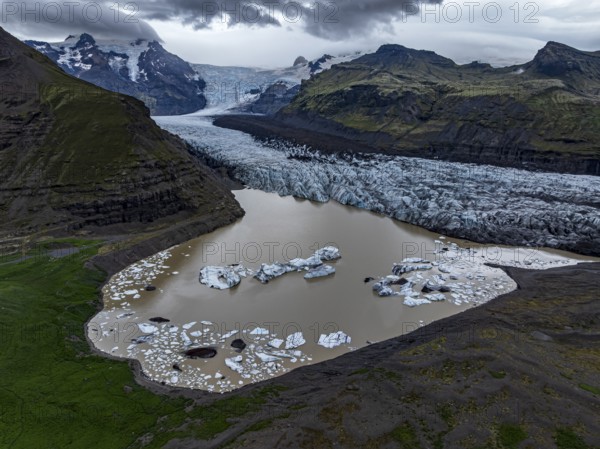 Glacier, glacier tongue, glacier lake, mountains, cloudy, aerial view, summer, Svinafellsjökull, Skaftafell, Iceland
