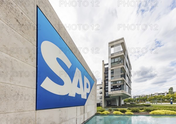 Logo and building of the software company SAP SE. Walldorf, Baden-Württemberg, Germany