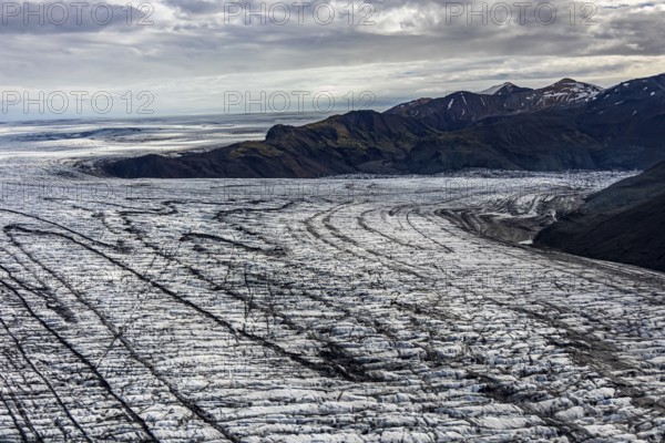 Glacier, crevasses, ice, aerial view, black ice, climate change, summer, mountains, Skeidararjökull, Skaftafell, Vatnajökull National Park, Iceland