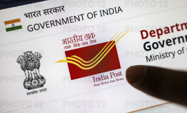 New Delhi, India – August 23, 2025: In this photo illustration, the India Post logo is seen on a digital display. The Indian Department of Posts has announced a temporary suspension of most postal services to the United States from Aug 25