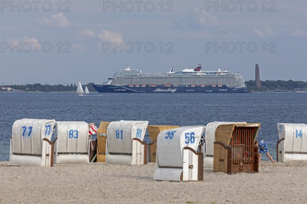 Cruise ship Mein Schiff 7, Laboe Naval Memorial, Kiel Fjord, beach chairs on the beach at Strande, Schleswig-Holstein, Germany