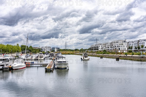 New Graf Bismarck urban quarter on the Rhine-Herne Canal, residential and commercial development on the site of the former Graf Bismarck colliery power station, marina, on the canal, in Gelsenkirchen, North Rhine-Westphalia, Germany