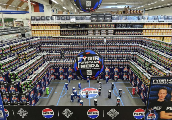 Football stadium built from beverage cans for the European Women's Championship in the supermarket, Keflavik, Reykjanesbær, Iceland