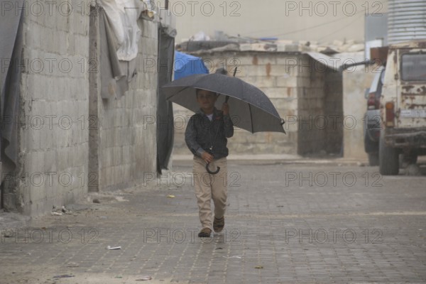 Syrian children playing in a refugee camp near the Turkish border on World Children's Day. Aleppo, Syria March 2, 2017, Aleppo, Syria