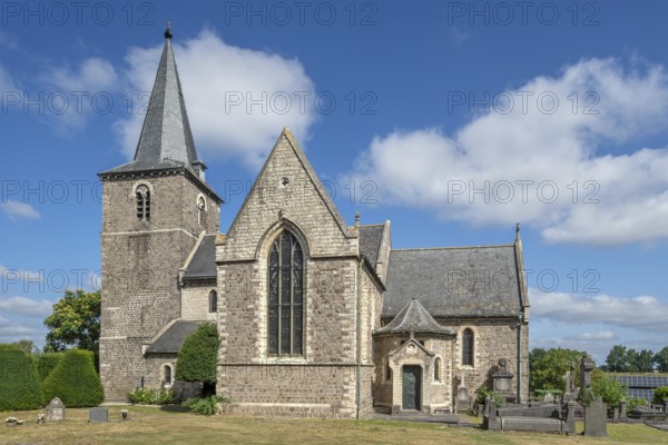 The old Sint-Pieterskerk, St. Peter's Church, now necropolis with graves of Belgian WWI soldiers buried inside at Grimde, Tienen, Tirlemont, Belgium