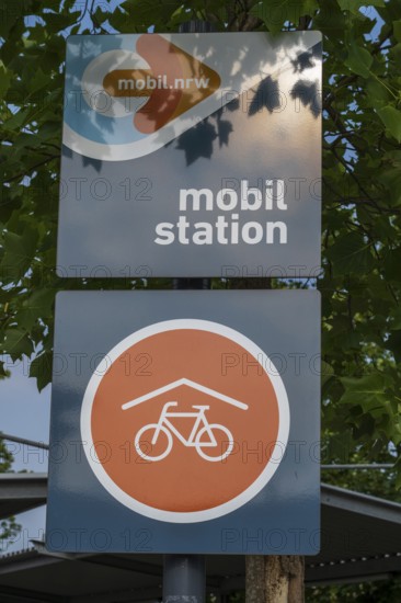 Sign with lettering and logo, mobil.North Rhine-Westphalia, mobil station, Covered bicycle parking, Rheda-Wiedenbrück, Westphalia, North Rhine-Westphalia, Germany