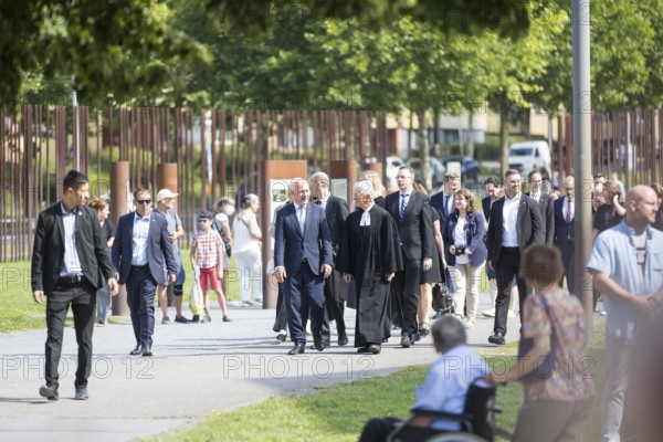 Kai Wegner (Governing Mayor of Berlin) walks to a wreath-laying ceremony to commemorate the division of the city from 13 August 1961 to 9 November 1989 and to remember the victims of tyranny at the Bernauer Strasse memorial, Berlin, 13.08.2025