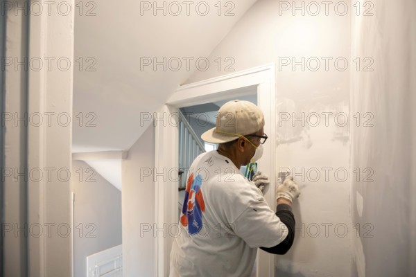 Detroit, Michigan - Workers remodel a house in the Morningside neighborhood that had been vacant for many years. Detroit lost nearly two-thirds of its residents from 1950 to 2020 but has been growing modestly in recent years