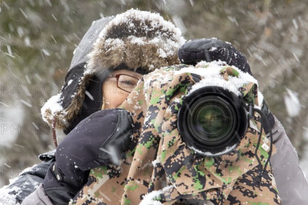 Photographer Veronique Amiard photographs the landscape in winter, Heavy snowfall, Gaspesie national park, Province of Quebec, Canada, North America