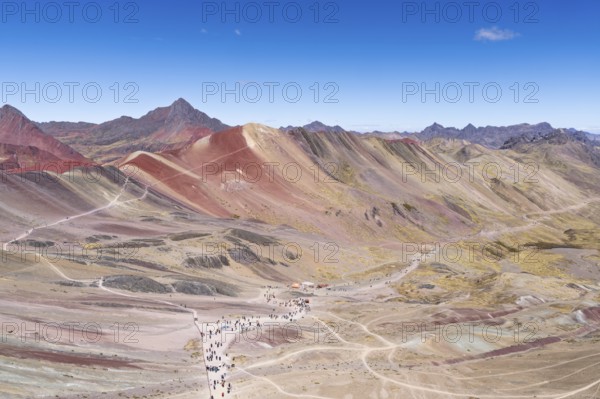 Vinicunca, colourful mountains in the background, in the Peruvian Andes, Cusipata district, Cusco, Peru