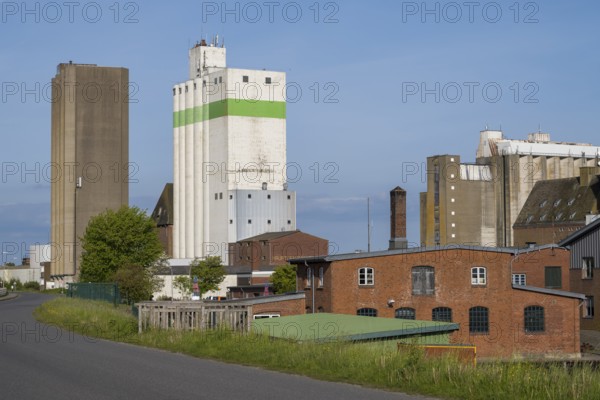 Grain silos, warehouses, land trade, outer harbour, Husum, North Frisia, North Sea, Schleswig-Holstein, Germany