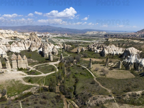 Breathtaking rock formations and valleys in Cappadocia under a blue sky, aerial view, Love Valley, Göreme National Park, Göreme Tarihî Millî Parki, Nevsehir province, Nevsehir, Cappadocia, Cappadocia, Cappadocia, Cappadocia, Central Anatolia, Turkey