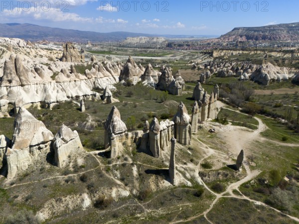 Wide rocky backdrop with outstanding geological formations in Cappadocia, aerial view, Love Valley, Göreme National Park, Göreme Tarihî Millî Parki, Nevsehir Province, Nevsehir, Cappadocia, Cappadocia, Cappadocia, Cappadocia, Central Anatolia, Turkey