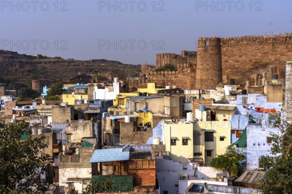 Mehrangarh Fort, above colourful houses, Blue City, Gulab Sagar, Jodhpur, Rajasthan, India