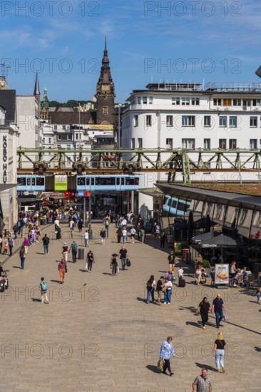 The Wuppertal suspension railway arrives at the Döppersberg stop in the city centre of Wuppertal, Germany