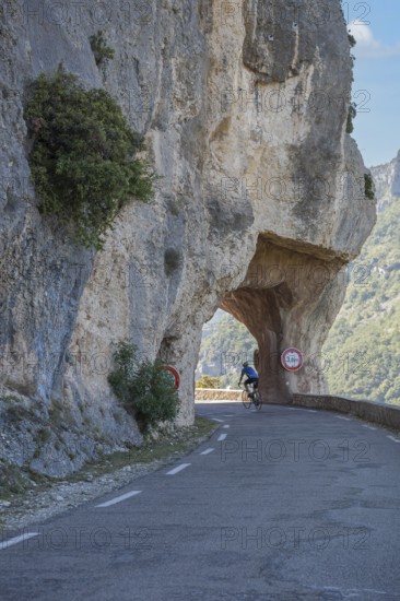 Road and rock arch, Gorges de la Nesque, Vaucluse, Provence-Alpes-Cote dAzur, South of France, France