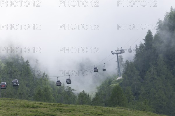 Jennerbahn gondolas in the fog near Schönau am Königssee