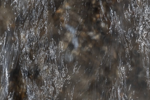 Close-up of moving water with a pattern of light and shadow, long exposure, North Sea, Denmark