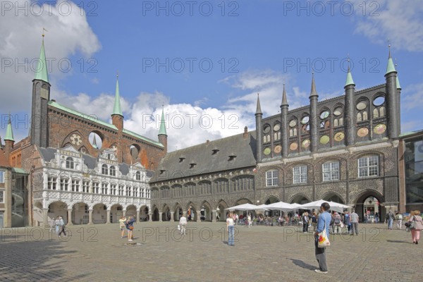 Renaissance and Gothic town hall and pedestrians, tourists, Brick Gothic, brick buildings, market, Old Town, Lübeck, Schleswig-Holstein, Germany