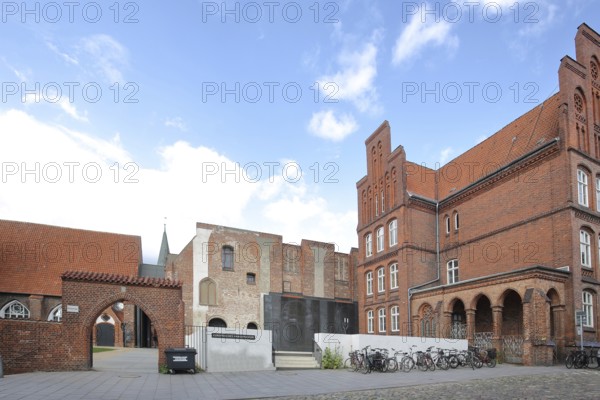 Archway to the entrance of the European Hanseatic Museum and Ernestine School, Old Town, Lübeck, Schleswig-Holstein, Germany
