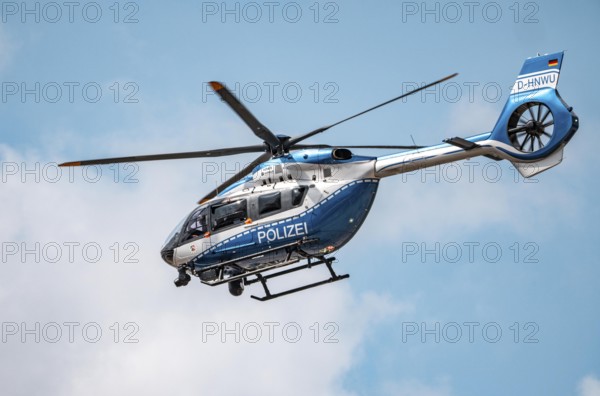 Police helicopter, Airbus Helicopters H145, of the North Rhine-Westphalia State Police, after take-off at Düsseldorf Airport, Police Air Wing