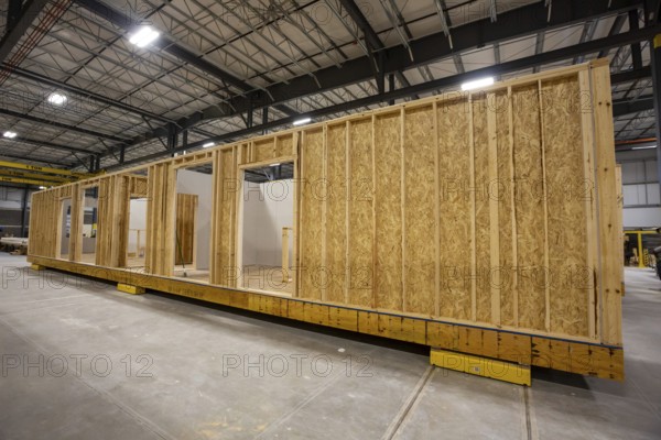 Romulus, Michigan - Workers build apartments in Ginosko Modular 's factory using modular construction methods. The units will be assembled into an apartment building in Detroit for low to moderate income households