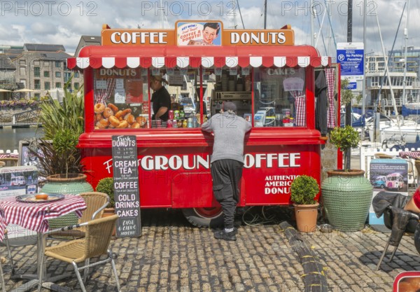 Coffee Donuts red booth cafe, The Barbican, city of Plymouth, Devon, England, UK