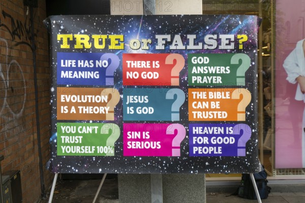 OAC Evangelists religious poster of questions about Christianity and God, Torquay, Devon, England, UK