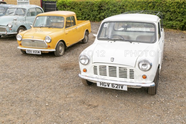 Austin Morris Mini 1000 pick-up vehicle and Leyland Mini 95 pick-up vehicle c 1979 - 1980 on display at auction, UK