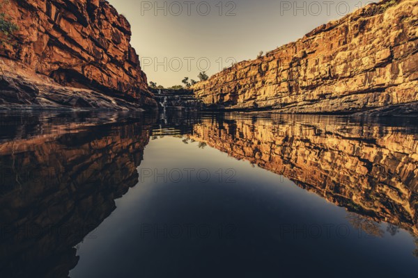 Bell Gorge waterfall, a body of water in north-west Australia in the Kimberley. Sunrise in the outback, Australia