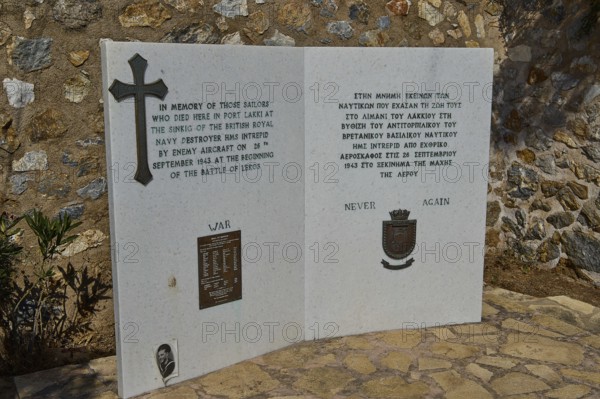 HMS Intrepid, British warship, Greek warship AT Olga, memorial plaque with inscription and cross in memory of fallen soldiers, photos relating to WW2, Battle of Leros, Lakki, Leros, Dodecanese, Greek Islands, Greece