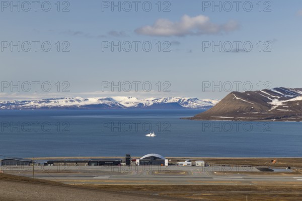 View of Svalbard Airport Longyear, bay, sea, mountain range, Longyearbyen, Spitsbergen, Svalbard