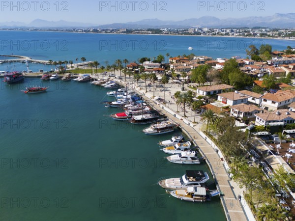 Harbour full of boats and yachts along a palm-lined promenade by the sea, aerial view, harbour, Side, Manavgat, Antalya province, Turkey