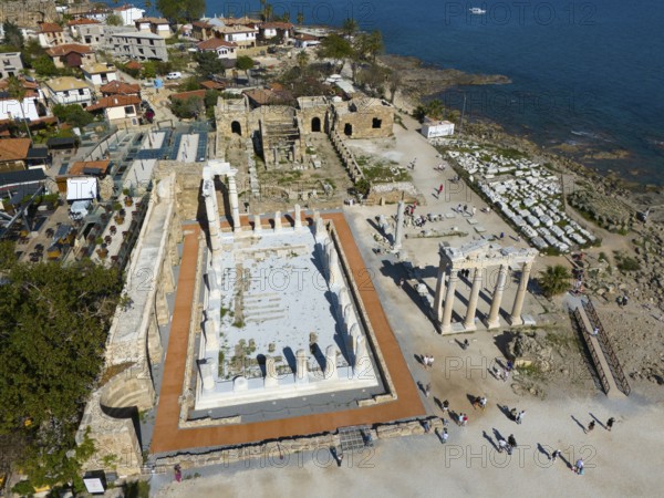 Ancient ruins near the coast with remains of a temple, historical ambience, aerial view, Temple of Apollo, Side, Manavgat, Antalya province, Turkey