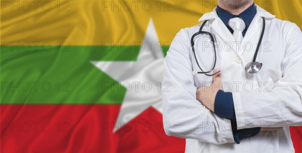 Male doctor with stethoscope on Myanmar flag. Doctor holding stethoscope on Myanmar flag