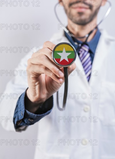 Myanmar health and medical insurance concept. Myanmar healthcare system, doctor holding stethoscope