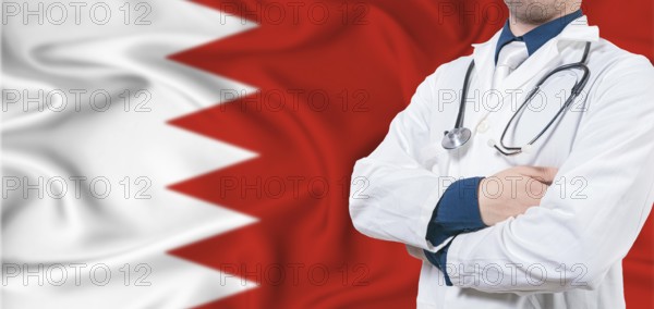 Bahrain healthcare concept. Male doctor on Bahrain flag. Doctor with crossed arms on Bahrain flag