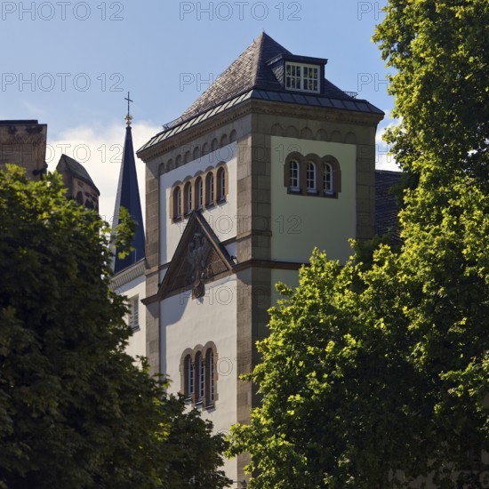 Max Planck Institute for Mathematics, church tower of Bonn Minster and Sterntor on Bottlerplatz with lots of greenery, Bonn, North Rhine-Westphalia, Germany