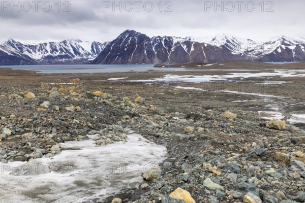 Melting glacier, rocks, water, mountain range, Cooper Camp, Spitsbergen, Svalbard