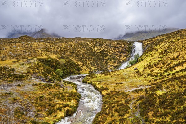 Eas a' Bhradain waterfall, Red Cuillin mountains, Loch Ainort, Isle of Skye, Scotland, UK