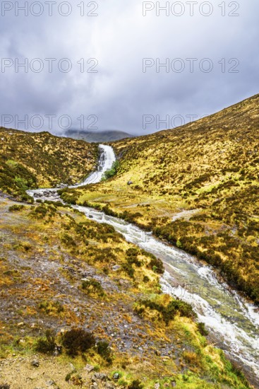 Eas a' Bhradain waterfall, Red Cuillin mountains, Loch Ainort, Isle of Skye, Scotland, UK