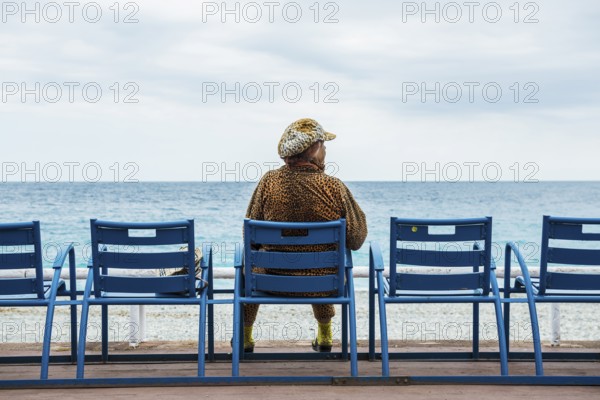 Woman on the promenade, Nice, Alpes Maritimes, Provence Alpes Cote d'Azur, French Riviera, South of France, France