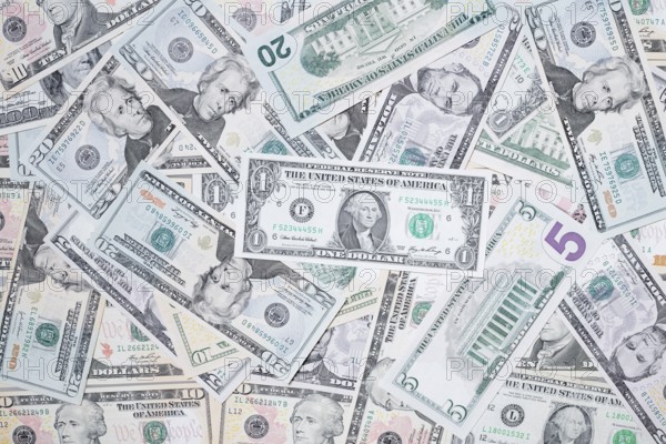 Various US dollar notes in a pile, banknotes