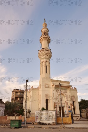 Mosque with minaret at sunrise, Esna, Egypt