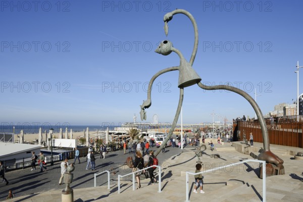 Sculpture Herring Esser by artist Tom Otterness on the seafront promenade, Scheveningen, The Hague, Dutch North Sea coast, South Holland, Netherlands