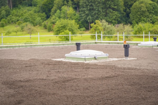 Ventilation shaft on a green roof with forest in the background, green roof, house construction, climate neutral